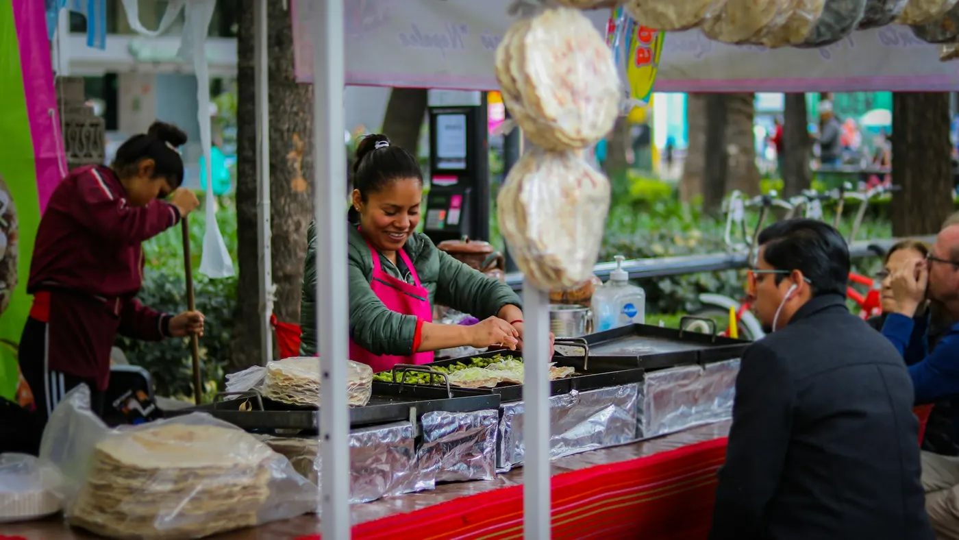 Cooks at a street stall in the morning